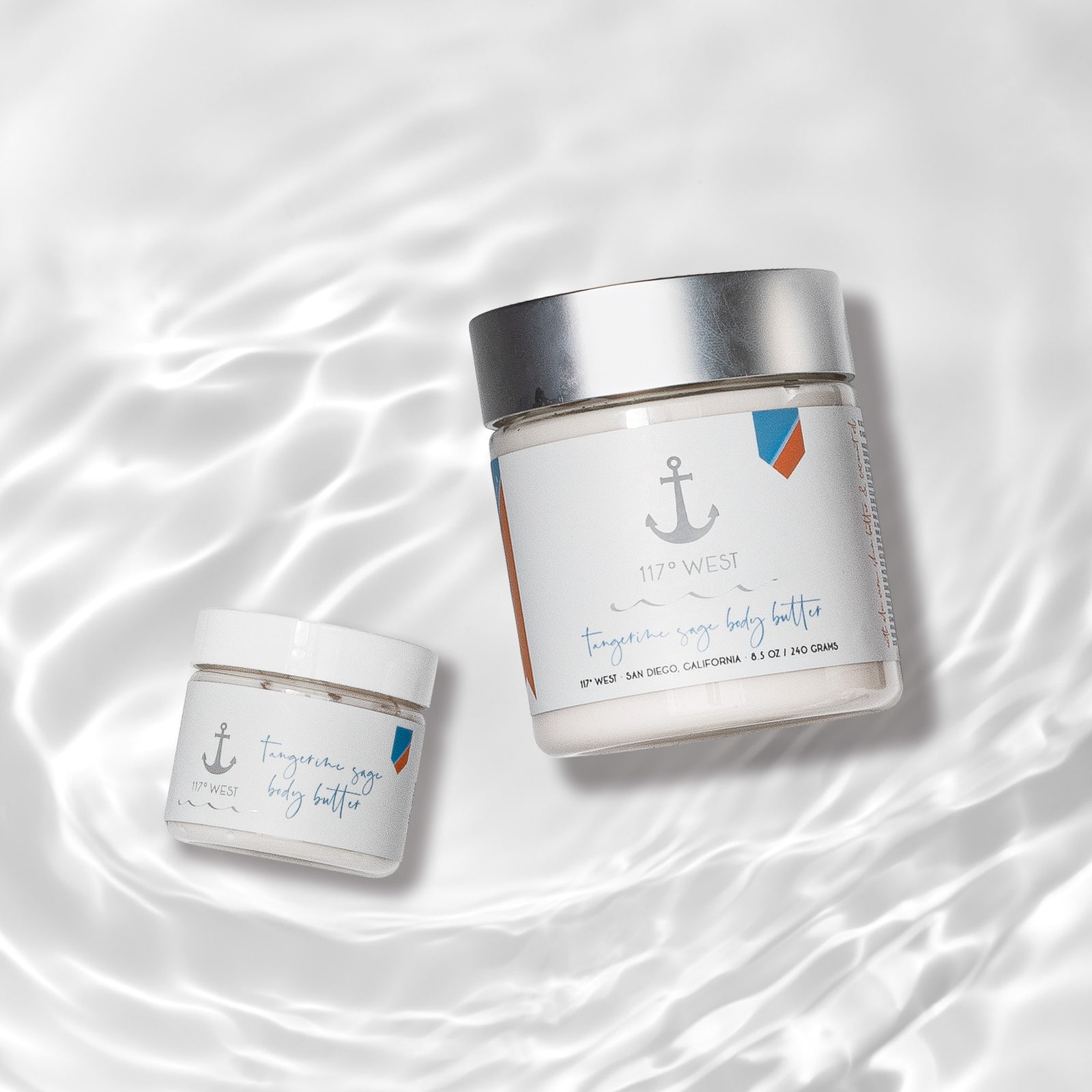 jar of natural tangerine sage body butter in 8oz jar and 2oz travel jar